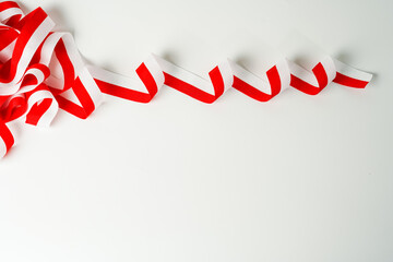 Obraz premium ribbon, red and white flag of Indonesia independence day August 17th, i love indonesia, isolated on white background