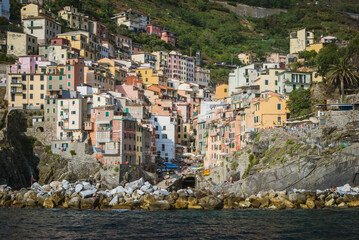 View og Riomaggiore village from the sea, Cinque Terre, Italy