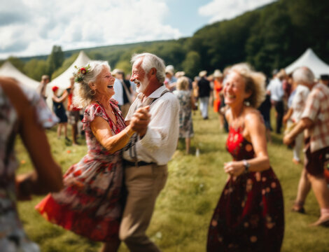 A couple of senior citizens happily dancing at an outdoor summer party. Generative AI