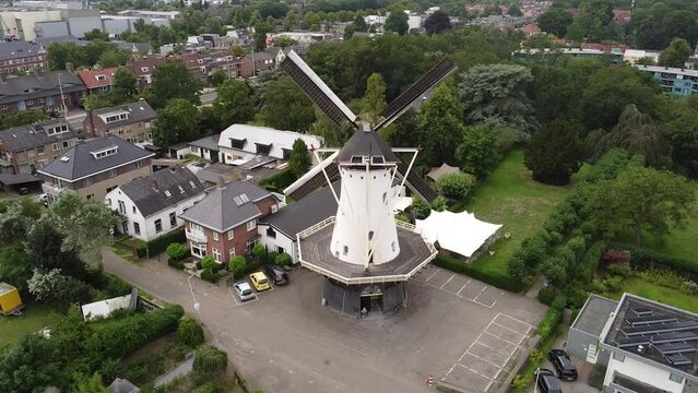 Zooming out view of the De Witte Molen windmill in Nijmegen, Gelderland, Netherlands.