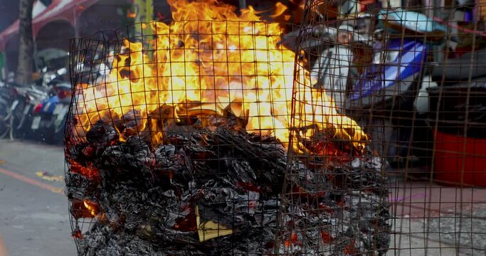 Chinese Ghost Festival, China, Zhongyuan Purdue, believers, burning paper money, Purdue