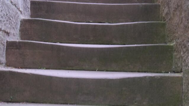 Old trampled stone stairs up in the castle