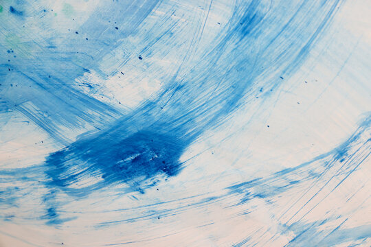 Acquerello su carta bianca, macchie di colore in varie tonalit&agrave; di azzurro, blu e verde