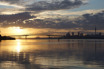 Fototapeta na wymiar Auckland City Harbour Bridge at Sunrise
