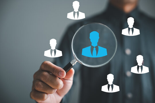 HRM Excellence Magnifier Glass Focuses On Manager Icon Among Staff Icons, Showcasing Effectiveness Of Human Resource Management In Recruitment, Leadership, Employee Development. Employees Selection