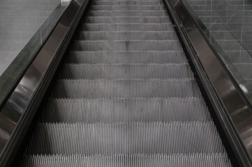 Close-up shot of an escalator In a dangerous and frightening atmosphere