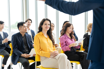 Businesspeople meeting and workshop seminar, business training, and coaching. Motivation group of colleagues or employees from the executive speaker.