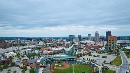 Aerial Louisville Slugger Field with city background - Powered by Adobe