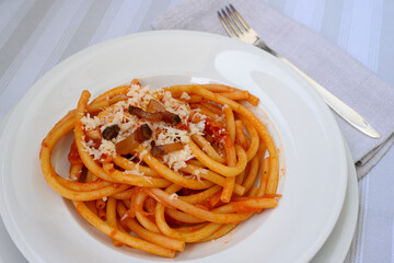 Bucatini all Amatriciana Italian Pasta from Lazio and Rome with Guanciale and Tomatos