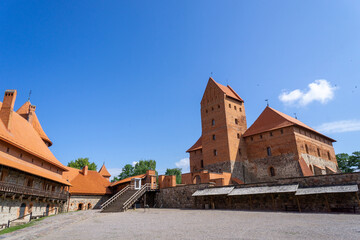 Interior of Trakai Castle. Full of towers and built by a red brick. Photo made on a sunny summer morning.