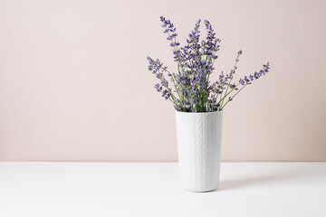 Bouquet of lavender in a small vase, minimal still life.