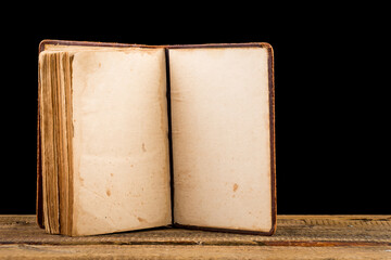ancient book shot on black background