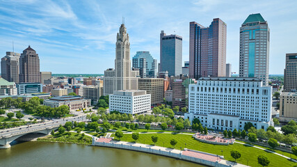 Fototapeta na wymiar East Bank Park with LeVeque Tower and One Columbus Center downtown buildings Columbus aerial