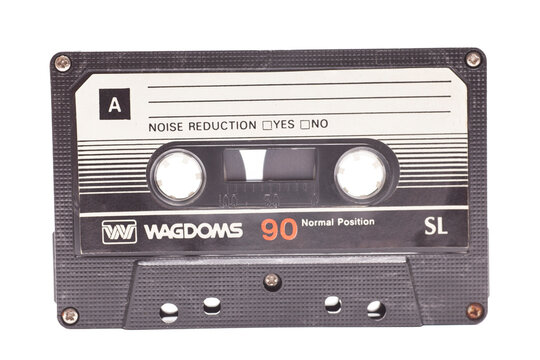 Close up of vintage audio tape cassette Wagdoms SL90 isolated on white background, vintage 80's music concept.