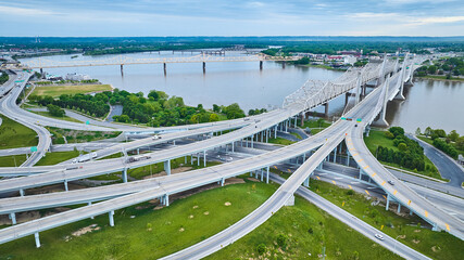 Aerial Louisville suspended highway road system lading to bridges over Ohio River Indiana side