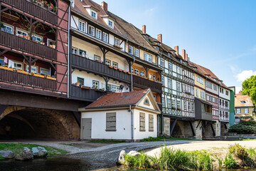 Fototapeta na wymiar Merchants Bridge, Kraemerbruecke in Erfurt, Germany. It is built over entirely with houses