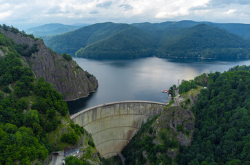 Obraz na płótnie Canvas Landscape with the Vidraru dam in the Fagaras mountains - Romania seen from above