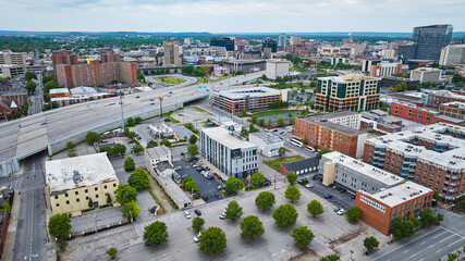 Louisville Kentucky aerial downtown office buildings, parking lot, and highway system - obrazy, fototapety, plakaty