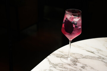 Fresh cocktail glass on a marble bar table