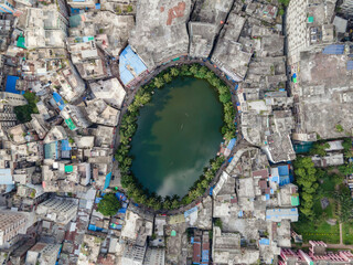 Aerial view of Gol Talab also known as Nawab Bari Pukur in Dhaka,Bangladesh.  - obrazy, fototapety, plakaty