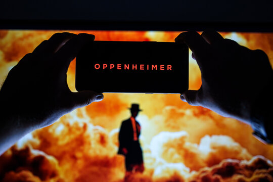 Oppenheimer Movie Logo And Poster On Screen