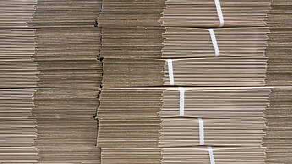 corrugated cardboard for packing, Pile of corrugated cardboard sheets and ready to use, Corrugated cardboard sheets