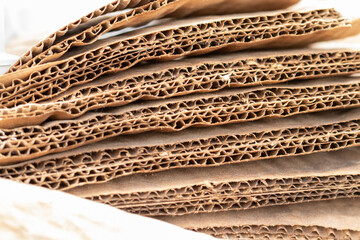 Close up side view of stacked card board. High quality photo