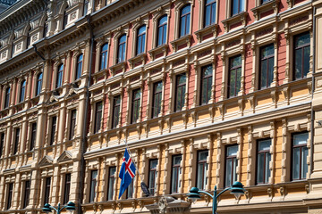 Facade of a building, with windows, in a city in Europe