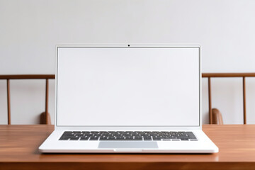 Fototapeta premium Laptop on the office desk with empty blank white screen. High quality photo