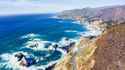 Obraz premium Big Sur coastline panorama at sunset, California, USA. Route 1 Big Sur California. A panoramic view of the Big Sur coastline along California.