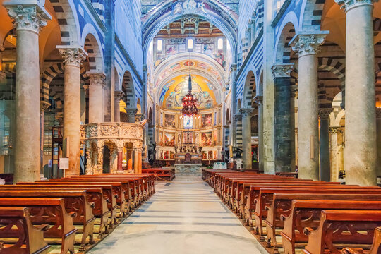 Pisa, Italy - May 17, 2023: Interior of the Duomo in Pisa, Romanesque Nave of Pisa cathedral Tuscany, Italy - Powered by Adobe