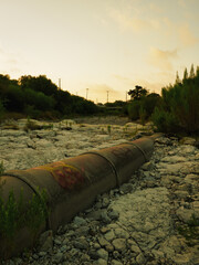 Sewer Pipe Crossing Creek