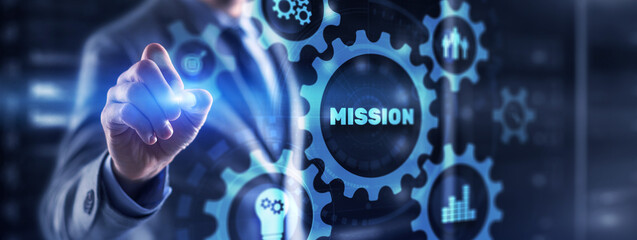 Bisinessman hand touching button mission. Finance background