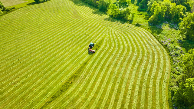 Farmer preparing field for farming aerial background asset