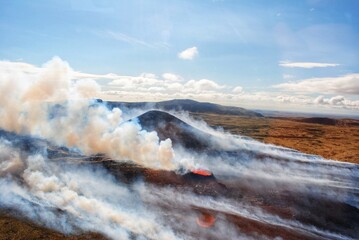 A volcano explodes near Litli-Hrutur, Iceland.