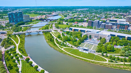 Aerial Scioto Mile Greenway and promenade with winding river leading out of Columbus city