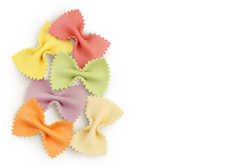 colorful farfalle pasta isolated on white background . Top view with copy space for your text. Flat...