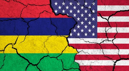 Flags of Mauritius and USA on cracked surface - politics, relationship concept