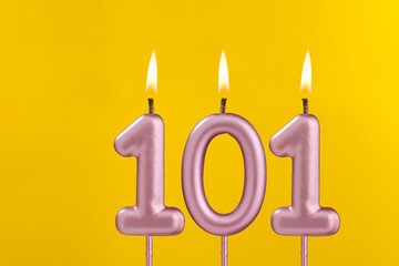 Candle 101 with flame - Birthday card on yellow luxury background