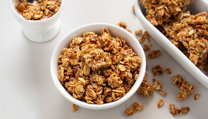 Peanut butter big cluster granola in white ramekin