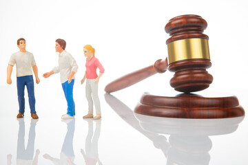 Miniature people. people solve dispute and relationship near gavel of law and justice. Laws to...