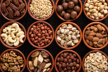 Mix of nuts in bowl . Food background