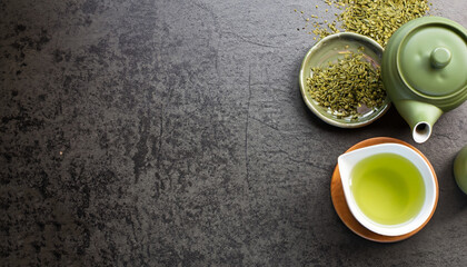 Green japanese tea on stone table. Top view with copy space