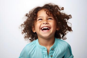 a professional portrait studio photo of a cute mixed race boy child model with perfect clean teeth laughing and smiling. isolated on white background. for ads and web design. Generative AI - obrazy, fototapety, plakaty