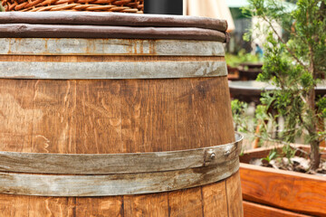 Traditional wooden barrel outdoors, closeup. Wine making