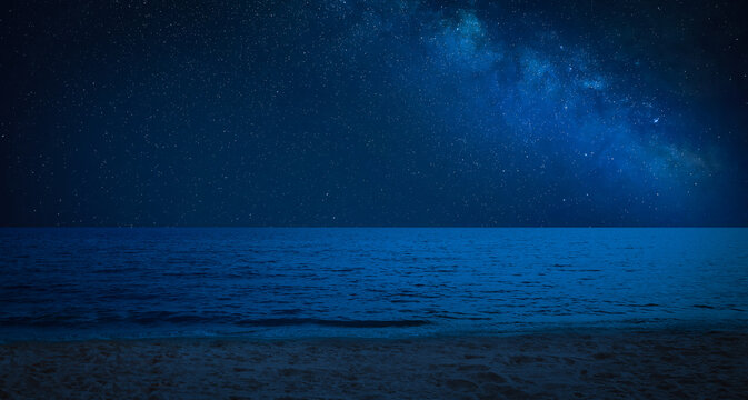 Amazing starry sky over sea at night