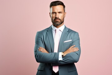 Fictional white serious business man in a blue suit and pink tie. Isolated on a pink background. Generative AI.