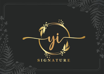 luxury gold signature initial yi logo design isolated leaf and flower