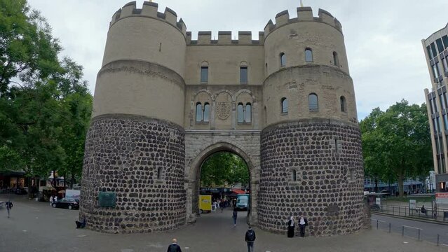 Aerial shot of Hahnen Gate on Rudolf Platz square in Cologne, Germany, slow motion