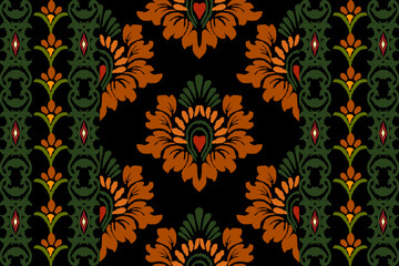 Ikat floral paisley embroidery on black background.Ikat ethnic oriental pattern traditional.Aztec style abstract vector illustration.Seamless pattern in tribal, folk embroidery, and Mexican style. 